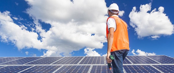 Solar panels with technician