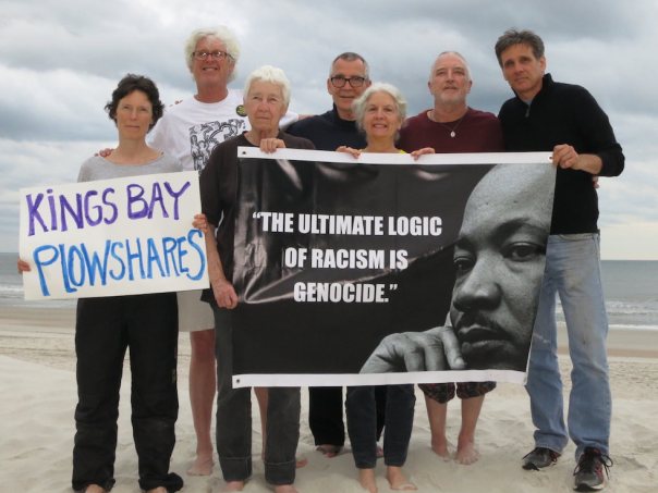 pre-action-photo-King-banner-Plowshares-sign-crop